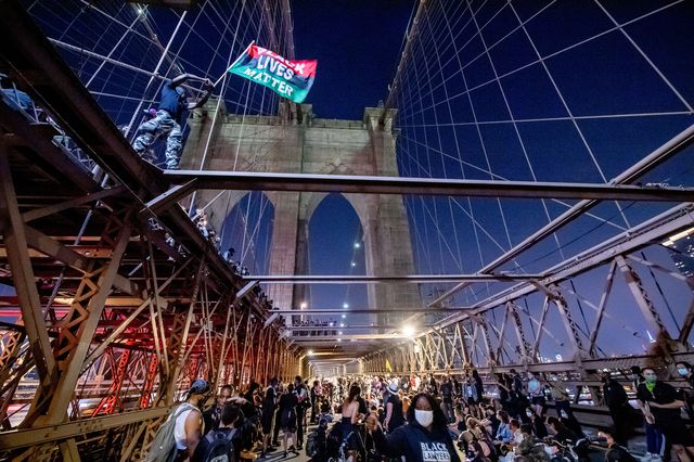 Protesters block traffic on the Brooklyn Bridge on September 25th. Protests sparked again as a reaction to the conclusion of Breonna Taylor's trial that ended without convictions for any of the officers involved.